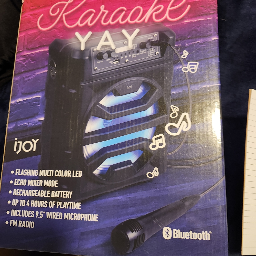 Black Portable Speaker with LED Lights and Karaoke Functionality